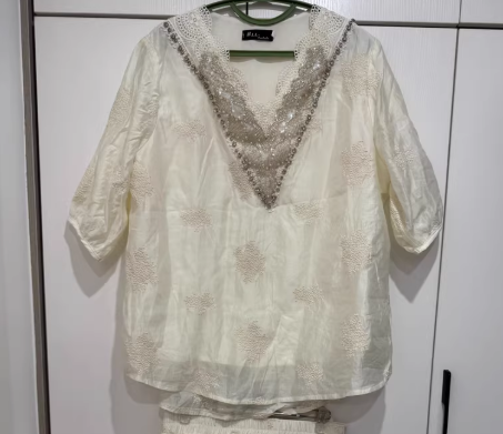French-style luxury lace set with rhinestone embellishments: V-neck top + mini skirt -Hans Peter Pleisch